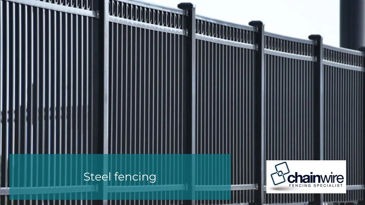 A galvanised steel and chainwire fence on a rural bushfire-prone property